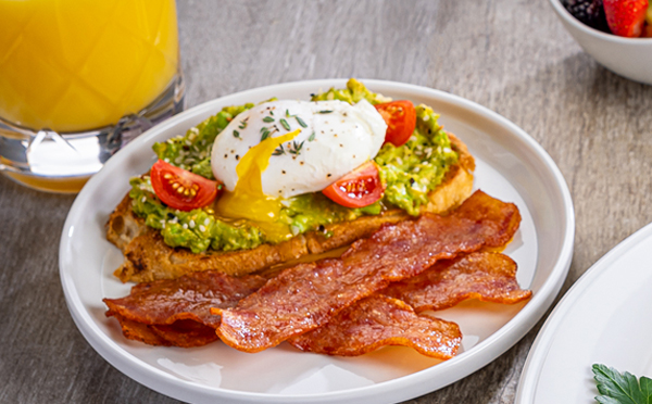 breakfast plate of fresh avocado toast and Al Fresco Fully Cooked Chicken Bacon