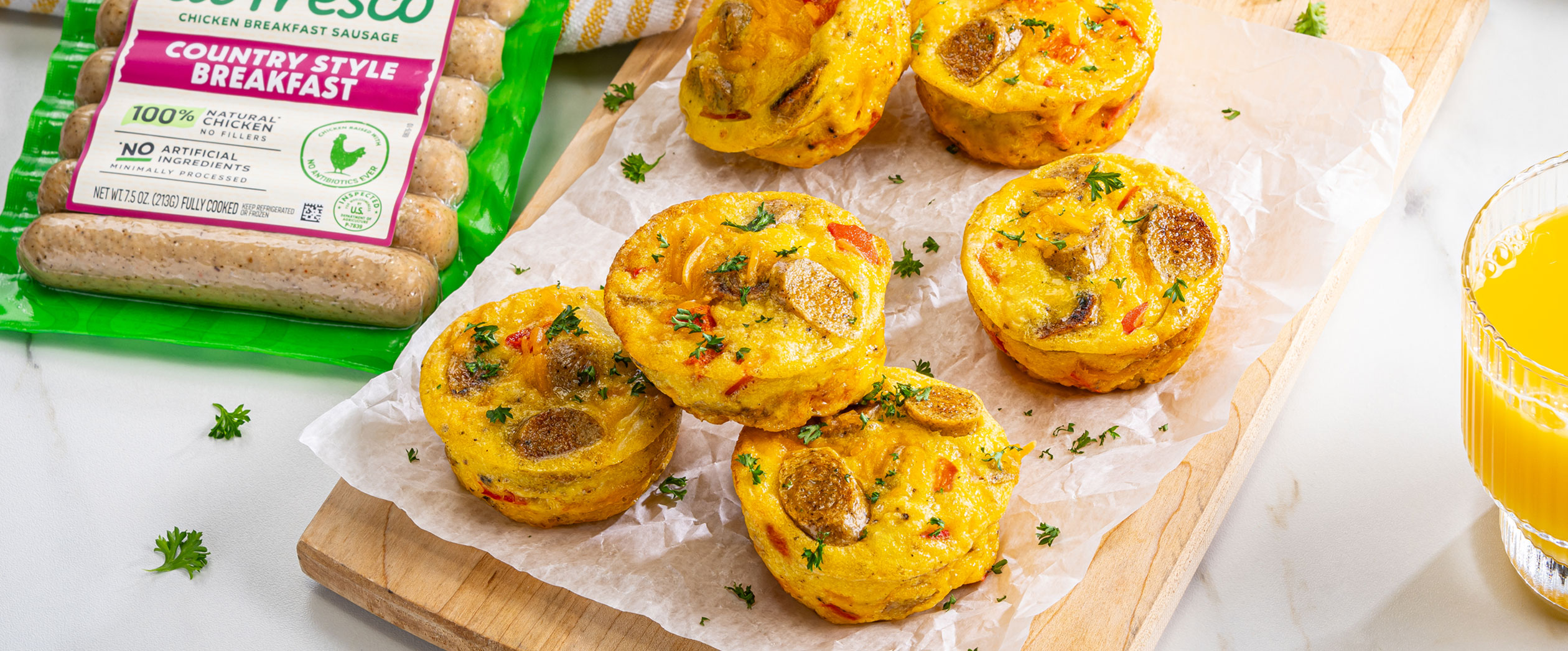 Freshly baked egg and Al Fresco chicken breakfast sausage frittatas on a table