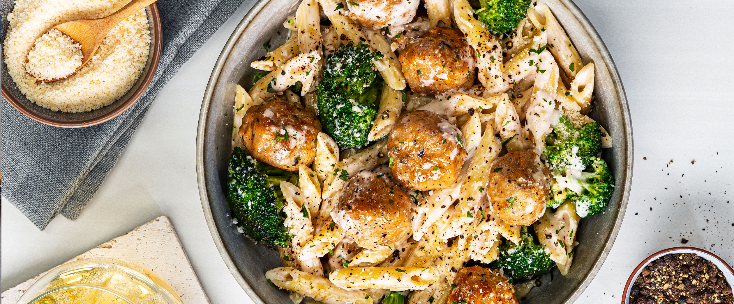 Bowl of Al Fresco chicken meatballs and broccoli and penne dish