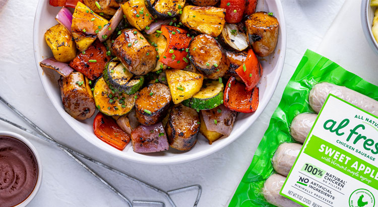 A bowl of freshly grilled Al Fresco Apple Chicken Sausage with fresh vegetables