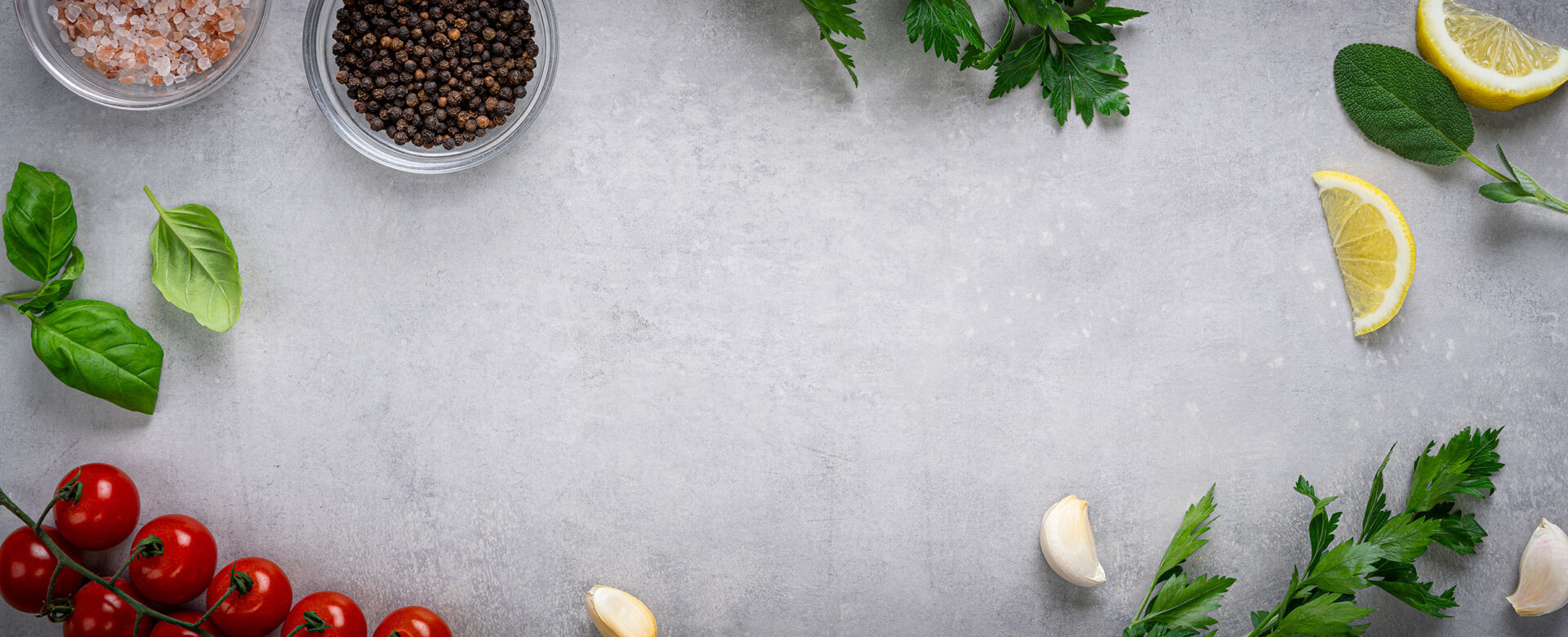 cement tabletop with fresh herbs and spices