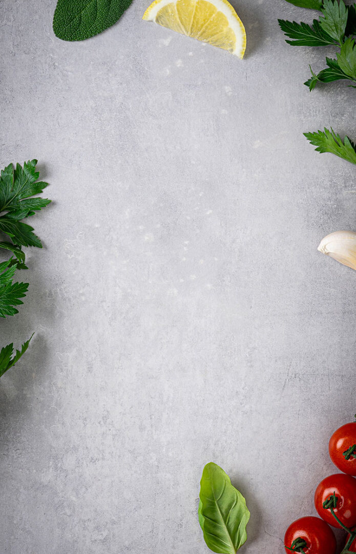 cement tabletop with fresh herbs and spices